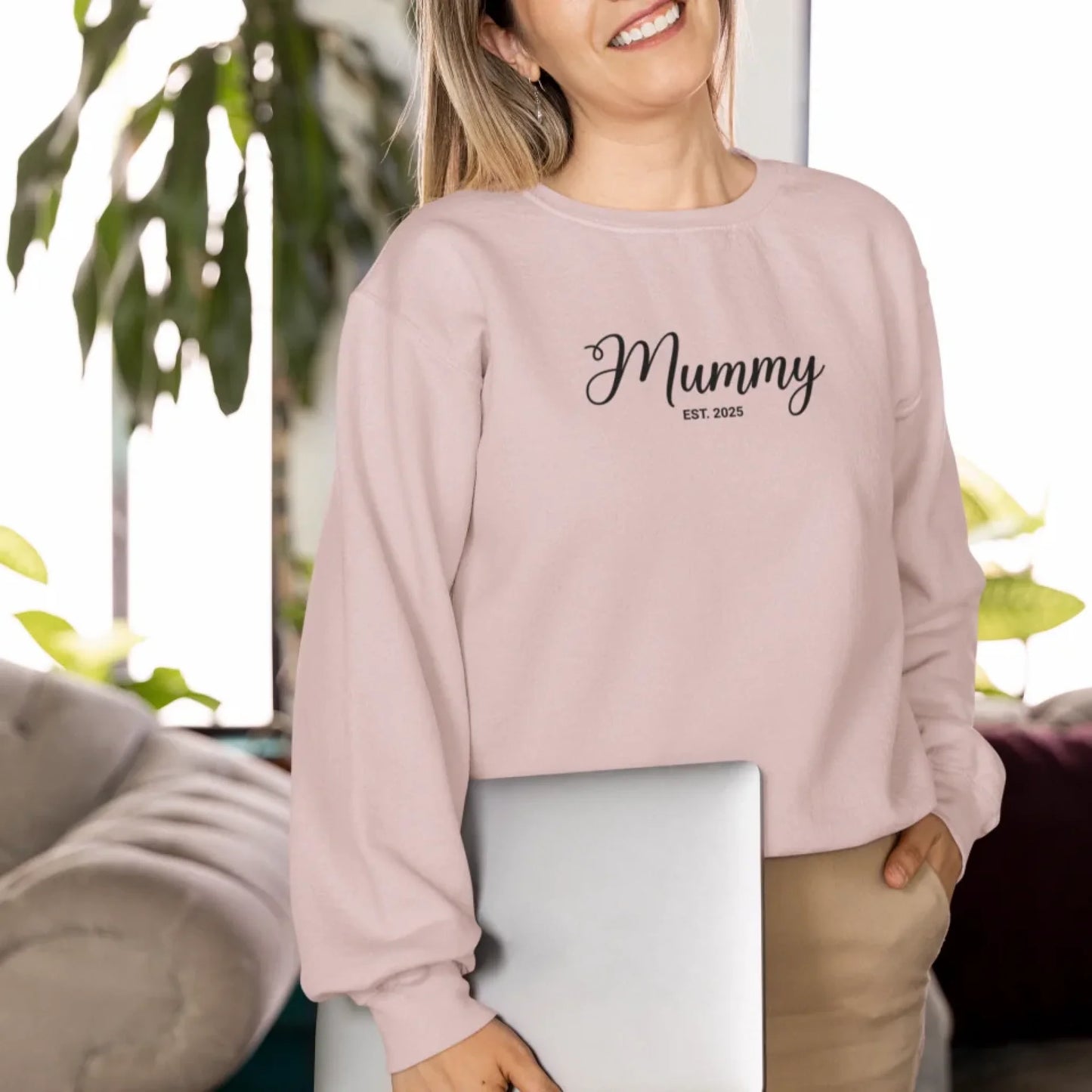 gildan-sweatshirt-mockup-featuring-a-smiling-woman-carrying-a-laptop-m34828 (1)