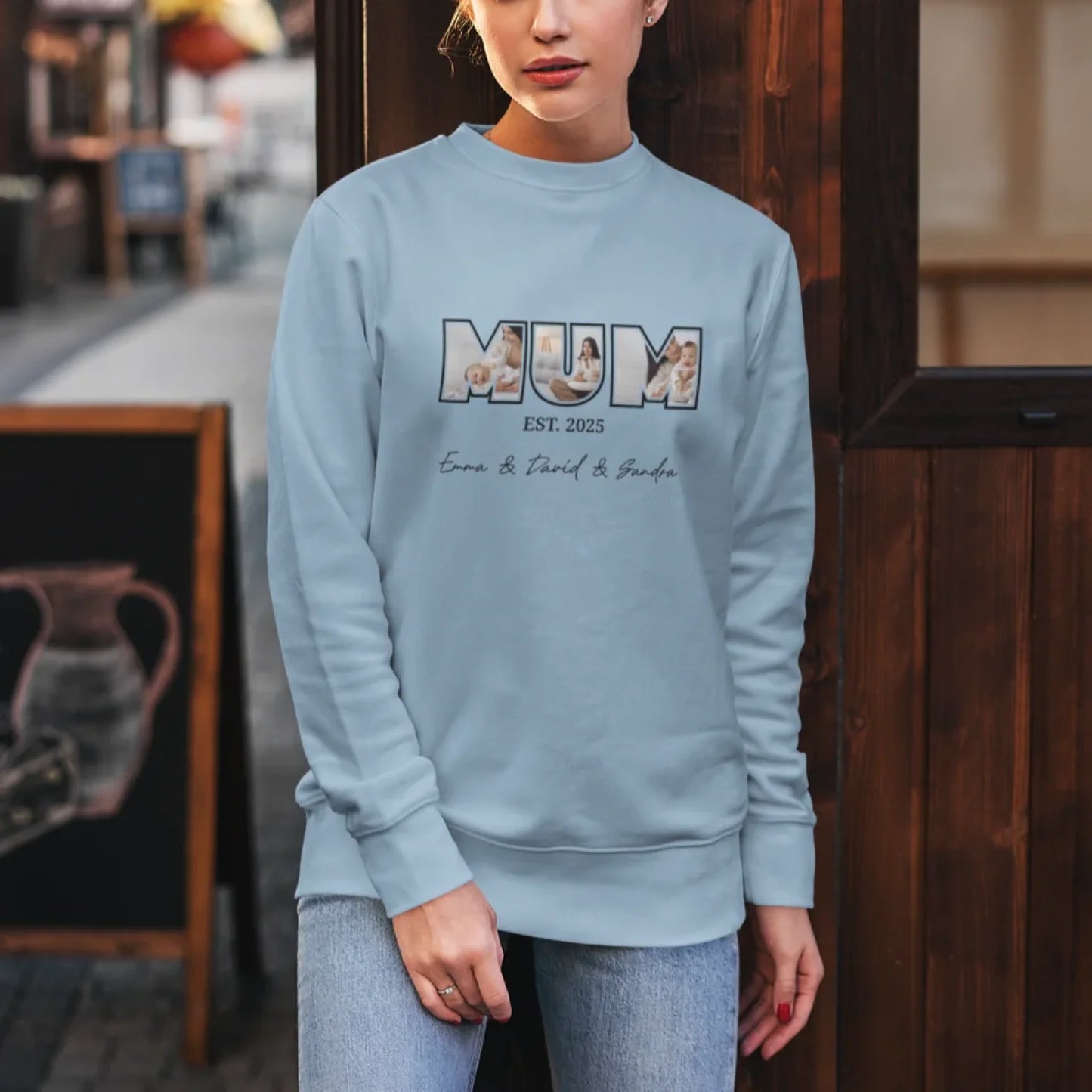 sweatshirt-mockup-featuring-a-woman-posing-against-a-wooden-wall-5293-el1 (1)